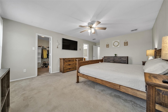 552 Lincoln Ave, Lavon, TX 75166 - carpeted bedroom with a spacious closet, baseboards, ceiling fan, and a closet