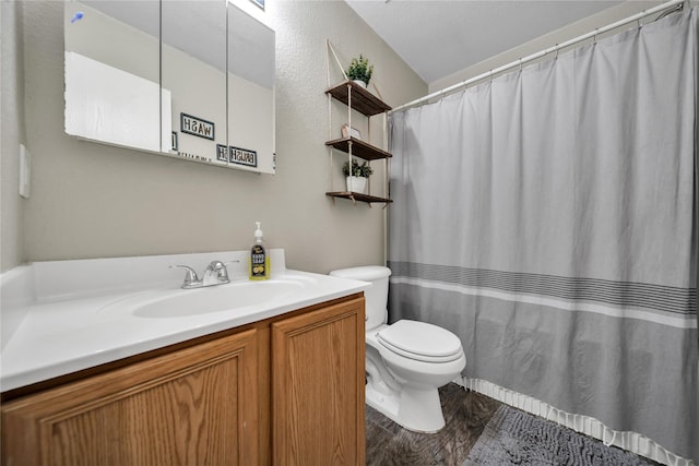 552 Lincoln Ave, Lavon, TX 75166 - full bath featuring toilet, vanity, curtained shower, and wood finished floors