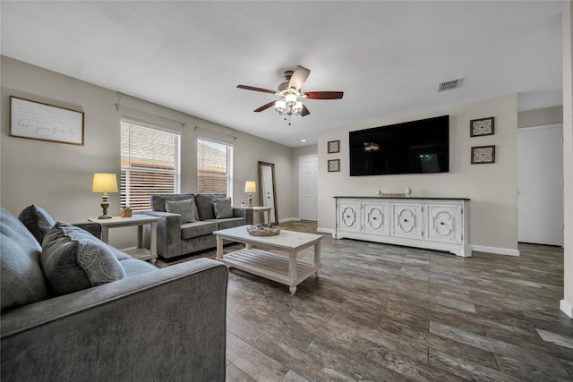 552 Lincoln Ave, Lavon, TX 75166 - living area with ceiling fan, baseboards, and dark wood-style floors