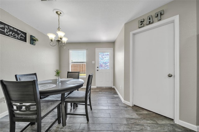 552 Lincoln Ave, Lavon, TX 75166 - dining space with a chandelier, wood finished floors, and baseboards