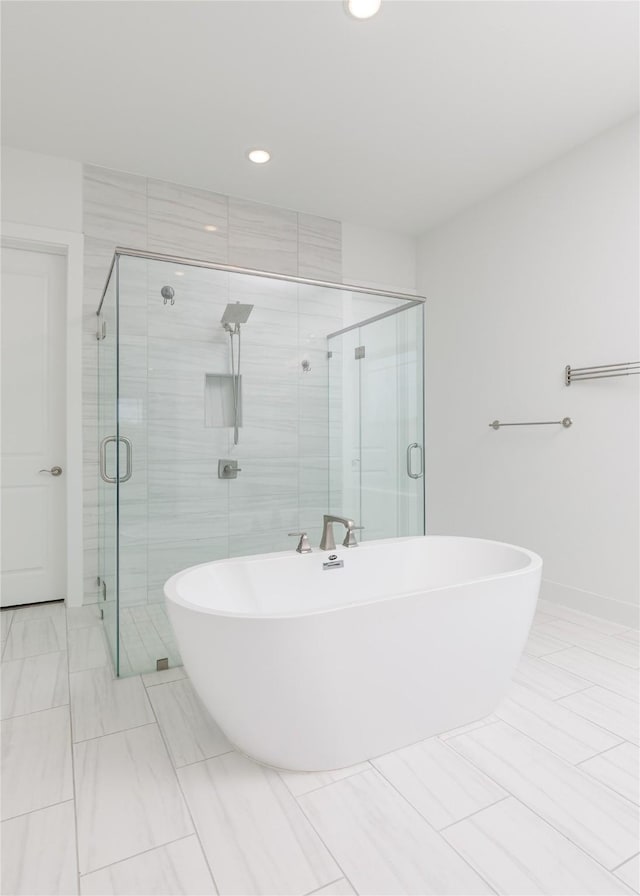 2130 Lassen Dr, Prosper, TX 75078 - bathroom with a freestanding bath, a shower stall, and recessed lighting