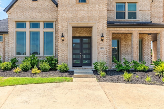 2130 Lassen Dr, Prosper, TX 75078 - entrance to property with french doors and brick siding