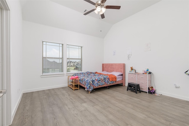 2130 Lassen Dr, Prosper, TX 75078 - bedroom with wood finished floors, lofted ceiling, baseboards, and ceiling fan