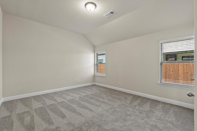 2616 Fargo Pl, Fate, TX 75087 - empty room with carpet floors, baseboards, and vaulted ceiling