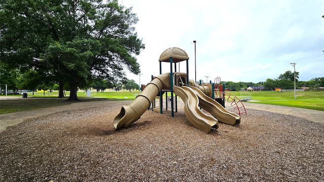 7719 Seydel St, Dallas, TX 75217 - community jungle gym with a lawn