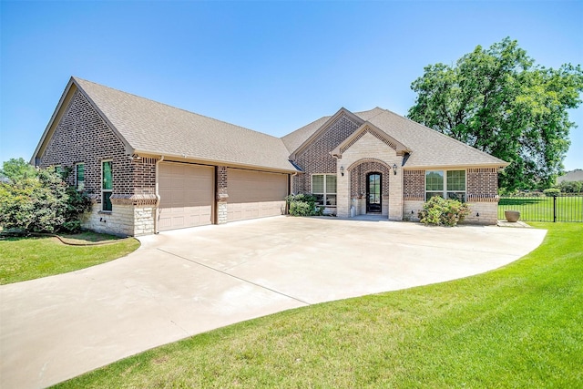3201 Steamers Ct, Granbury, TX 76049 - french provincial home with brick siding, a shingled roof, concrete driveway, and an attached garage