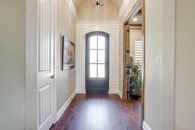 3201 Steamers Ct, Granbury, TX 76049 - entrance foyer with dark wood finished floors, a textured wall, arched walkways, and baseboards