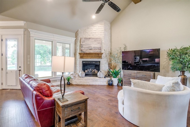 3201 Steamers Ct, Granbury, TX 76049 - living room with a ceiling fan, a fireplace, wood finished floors, and high vaulted ceiling