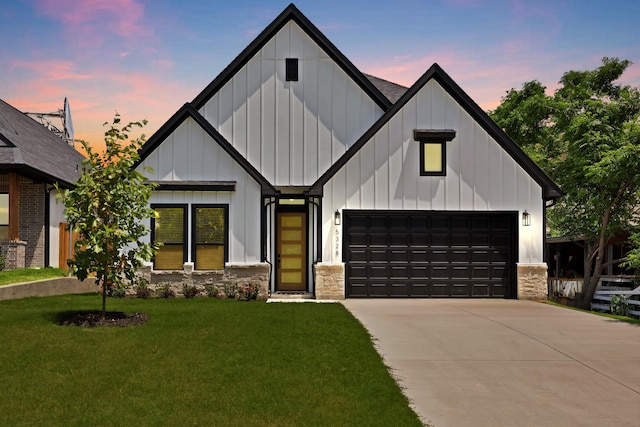 5328 Locke Ave, Fort Worth, TX 76107 - modern farmhouse with board and batten siding, a yard, concrete driveway, and stone siding
