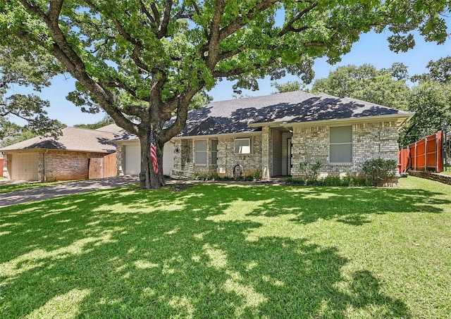 685 Cardinal Ridge Rd, Burleson, TX 76028 - view of front facade with brick siding, an attached garage, driveway, and roof with shingles
