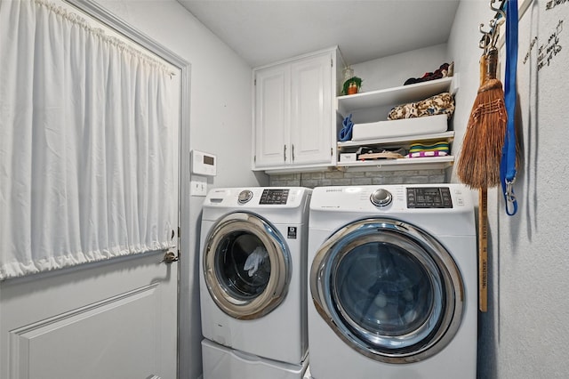 685 Cardinal Ridge Rd, Burleson, TX 76028 - washroom featuring washing machine and clothes dryer and cabinet space