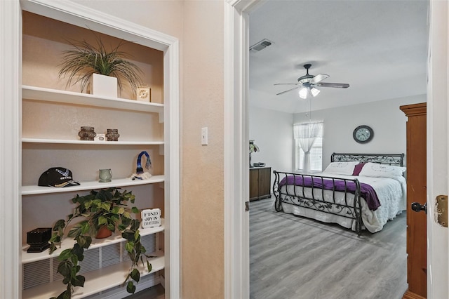 685 Cardinal Ridge Rd, Burleson, TX 76028 - bedroom featuring wood finished floors and ceiling fan