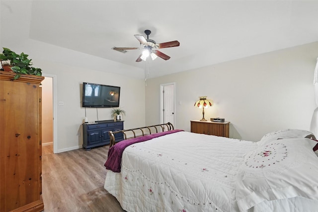 685 Cardinal Ridge Rd, Burleson, TX 76028 - bedroom with light wood finished floors, baseboards, and ceiling fan