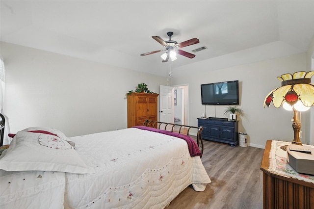 685 Cardinal Ridge Rd, Burleson, TX 76028 - bedroom featuring light wood-type flooring, baseboards, and a ceiling fan