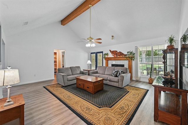 685 Cardinal Ridge Rd, Burleson, TX 76028 - living area featuring high vaulted ceiling, beam ceiling, wood finished floors, ceiling fan, and baseboards
