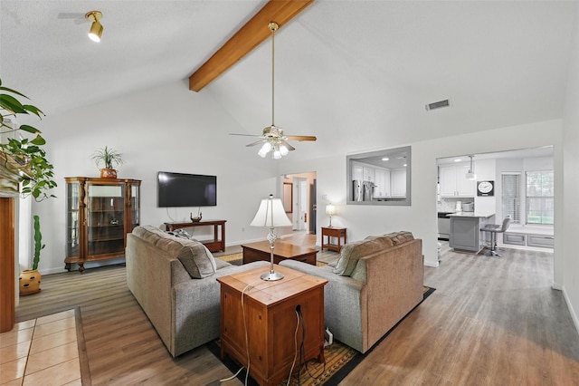 685 Cardinal Ridge Rd, Burleson, TX 76028 - living room featuring a ceiling fan, light wood finished floors, and baseboards