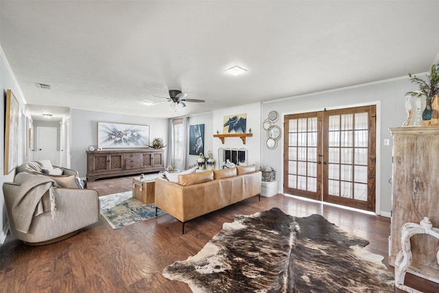 815 N Spikes Rd, Corsicana, TX 75110 - living area featuring french doors, wood finished floors, and ceiling fan