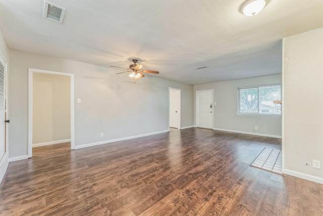 311 Franklin Dr, Euless, TX 76040 - spare room with ceiling fan, dark wood finished floors, and baseboards