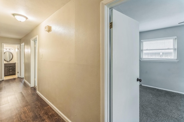 311 Franklin Dr, Euless, TX 76040 - corridor with baseboards and dark wood-style flooring