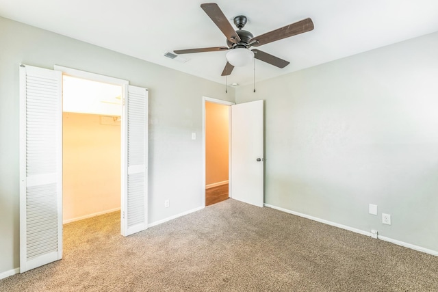 311 Franklin Dr, Euless, TX 76040 - unfurnished bedroom featuring carpet floors, baseboards, and ceiling fan
