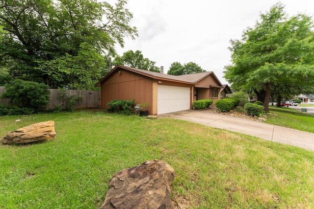 311 Franklin Dr, Euless, TX 76040 - view of front of home featuring a chimney, concrete driveway, and a garage