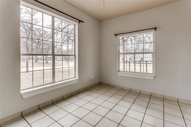 802 S Rusk St, Weatherford, TX 76086 - empty room featuring light tile patterned flooring