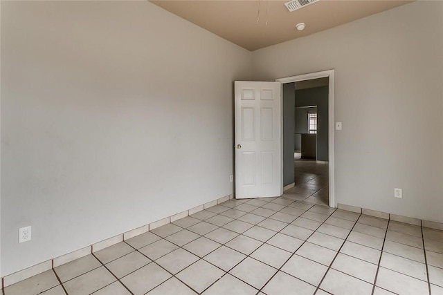 802 S Rusk St, Weatherford, TX 76086 - spare room featuring light tile patterned floors