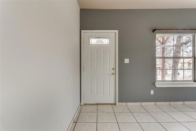 802 S Rusk St, Weatherford, TX 76086 - entrance foyer with light tile patterned floors and plenty of natural light