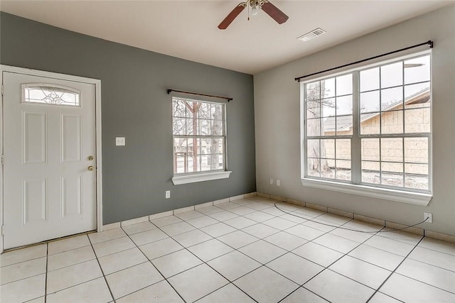 802 S Rusk St, Weatherford, TX 76086 - entryway with a ceiling fan, plenty of natural light, and light tile patterned floors