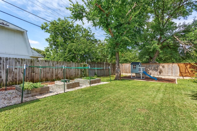 502 E Alexander Ln, Euless, TX 76040 - view of yard with a garden and a playground