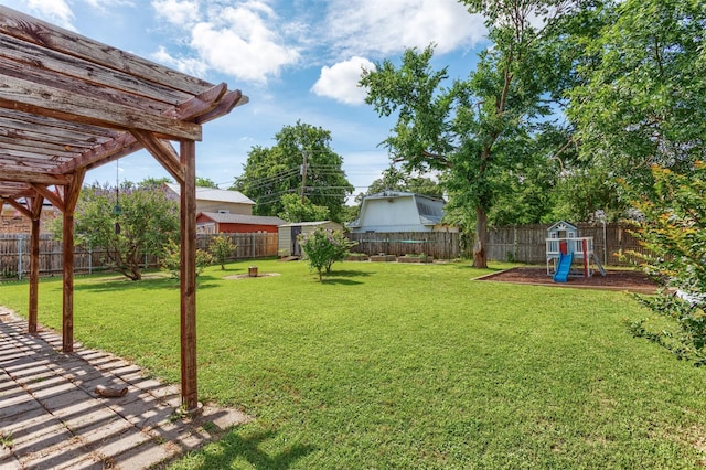 502 E Alexander Ln, Euless, TX 76040 - view of yard featuring a pergola and a playground
