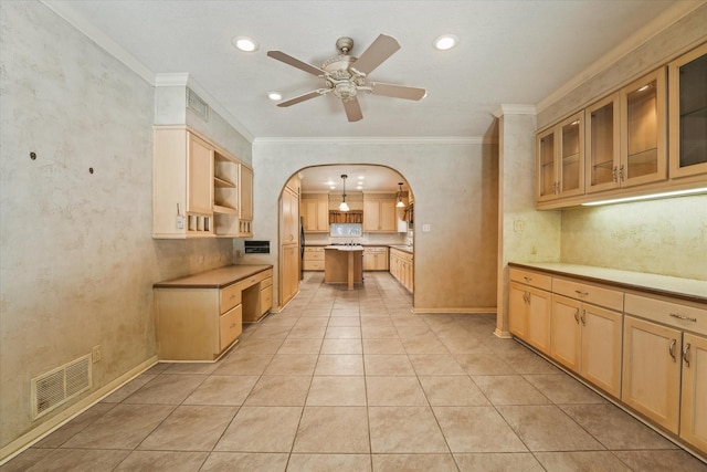 29 Timbergreen Cir, Denton, TX 76205 - kitchen featuring arched walkways, a ceiling fan, light brown cabinets, ornamental molding, and glass insert cabinets