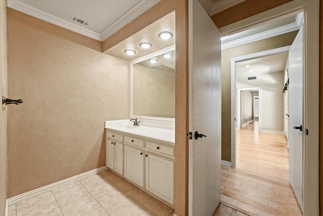 29 Timbergreen Cir, Denton, TX 76205 - bathroom featuring ornamental molding, vanity, and baseboards