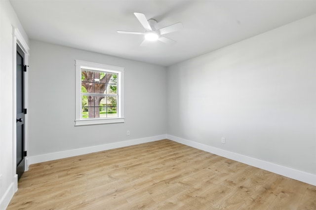 6713 Genoa Rd, Fort Worth, TX 76116 - spare room featuring light wood-type flooring, a ceiling fan, and baseboards