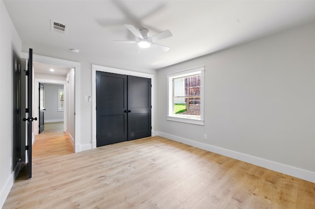 6713 Genoa Rd, Fort Worth, TX 76116 - unfurnished bedroom featuring baseboards, light wood finished floors, a closet, and ceiling fan
