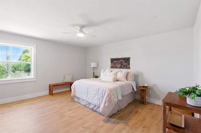 6713 Genoa Rd, Fort Worth, TX 76116 - bedroom with baseboards, light wood-type flooring, and a ceiling fan