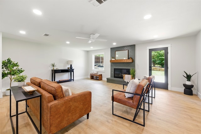 6713 Genoa Rd, Fort Worth, TX 76116 - living area with recessed lighting, plenty of natural light, a brick fireplace, ceiling fan, and light wood finished floors
