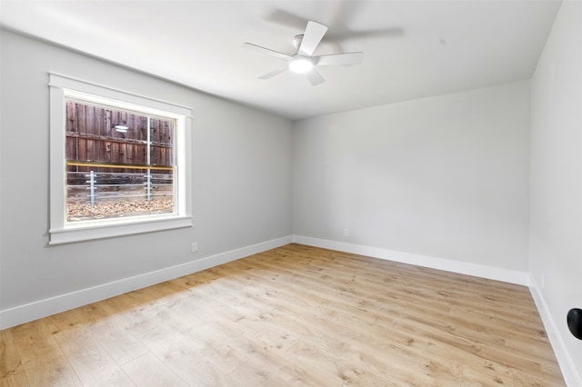 6713 Genoa Rd, Fort Worth, TX 76116 - unfurnished room with wood finished floors, ceiling fan, and baseboards