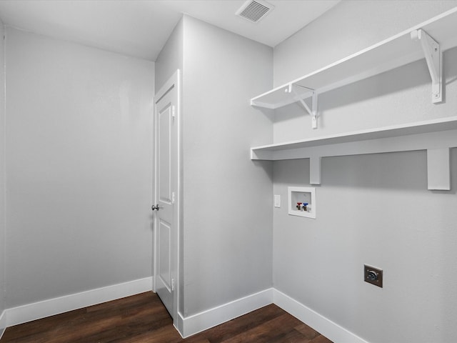 828 Ronald St, White Settlement, TX 76108 - washroom with hookup for an electric dryer, hookup for a washing machine, dark wood-style floors, and baseboards