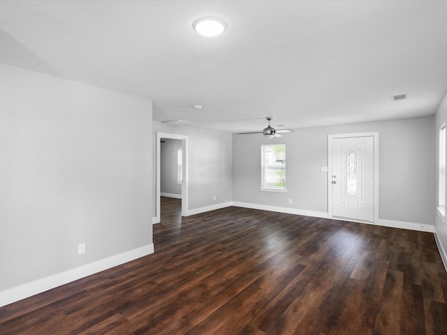 828 Ronald St, White Settlement, TX 76108 - spare room with a ceiling fan, dark wood-style floors, and baseboards