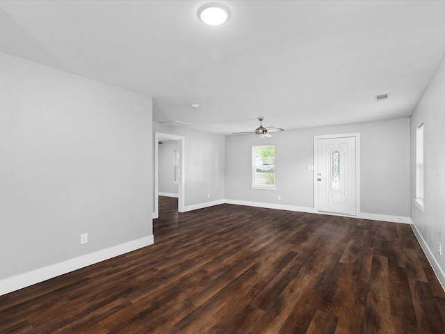 828 Ronald St, White Settlement, TX 76108 - spare room featuring wood finished floors, a ceiling fan, and baseboards