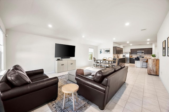 812 Draper Dr, Fate, TX 75189 - living room with light tile patterned floors and recessed lighting