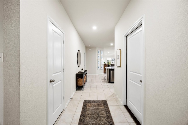 812 Draper Dr, Fate, TX 75189 - hall featuring light tile patterned flooring, recessed lighting, and baseboards