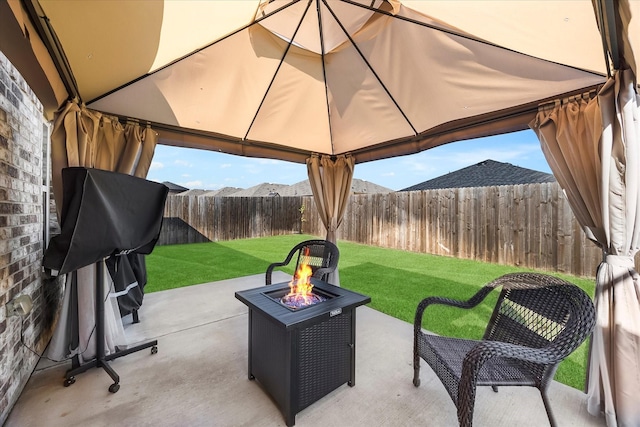 812 Draper Dr, Fate, TX 75189 - view of patio featuring a fire pit and a gazebo
