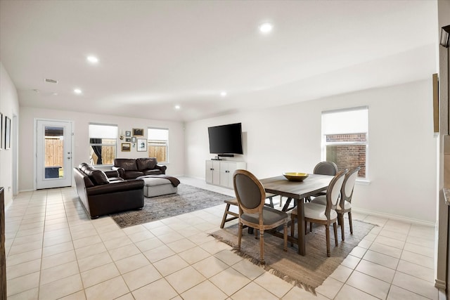 812 Draper Dr, Fate, TX 75189 - dining space with plenty of natural light, recessed lighting, light tile patterned floors, and baseboards