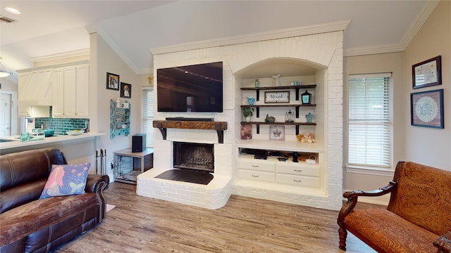 2916 Wilsonwood Way S, Sherman, TX 75092 - living room with ornamental molding, wood finished floors, and a fireplace