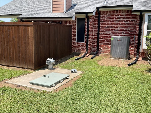 2916 Wilsonwood Way S, Sherman, TX 75092 - view of storm shelter with central air condition unit