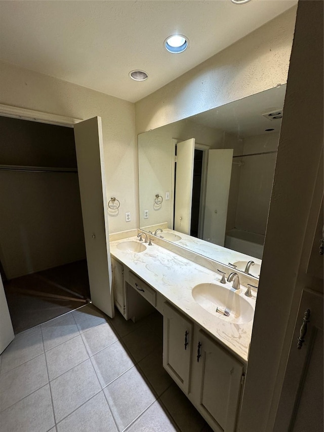 9706-9708 Springtree, Dallas, TX 75243 - full bathroom featuring double vanity and tile patterned flooring