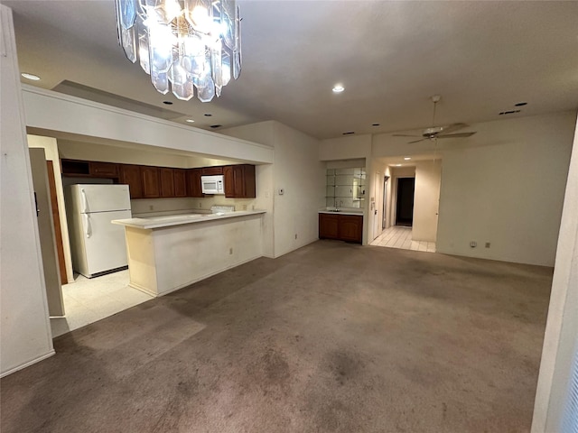 9706-9708 Springtree, Dallas, TX 75243 - unfurnished living room featuring light colored carpet, ceiling fan, recessed lighting, and a chandelier