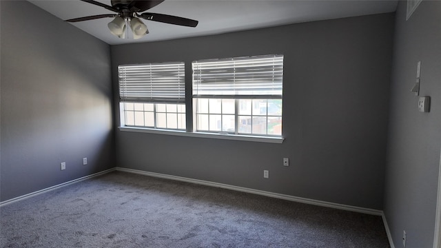 2405 Northlake Ct, Irving, TX 75038 - carpeted empty room with plenty of natural light, a ceiling fan, and baseboards